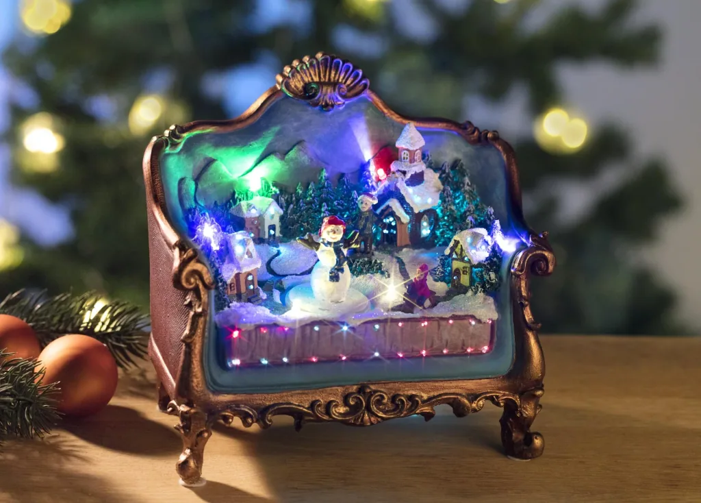 Sofa mit weihnachtlicher Szene mit Beleuchtung und Musik