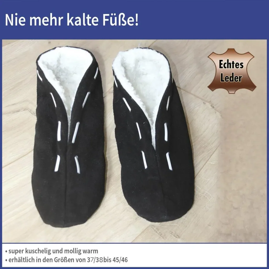 Fellhausschuhe, schwarz, Größe 39/40