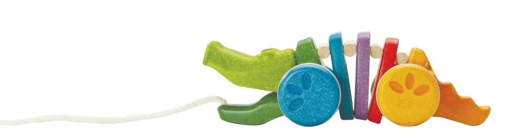 Plan Toys - Nachziehtier - Regenbogen Krokodil, Gummibaumholz