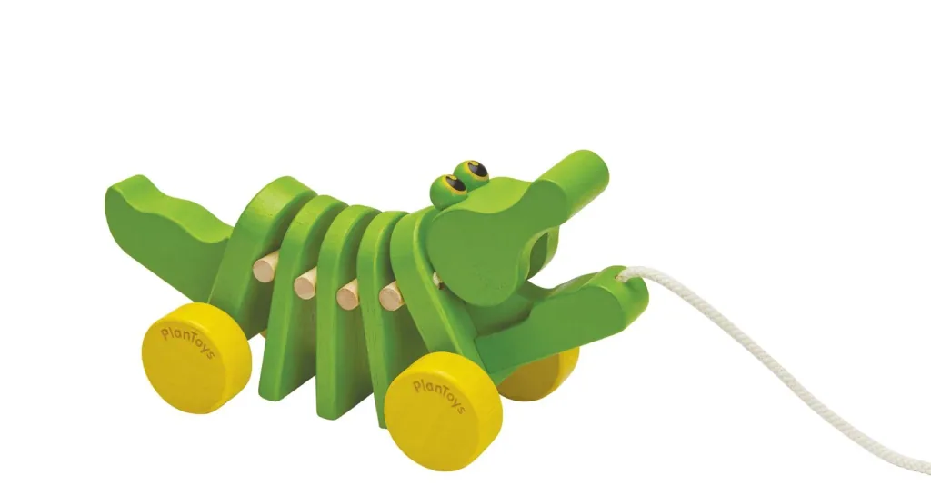 Plan Toys - Nachziehtier - Tanzendes Krokodil, Gummibaumholz