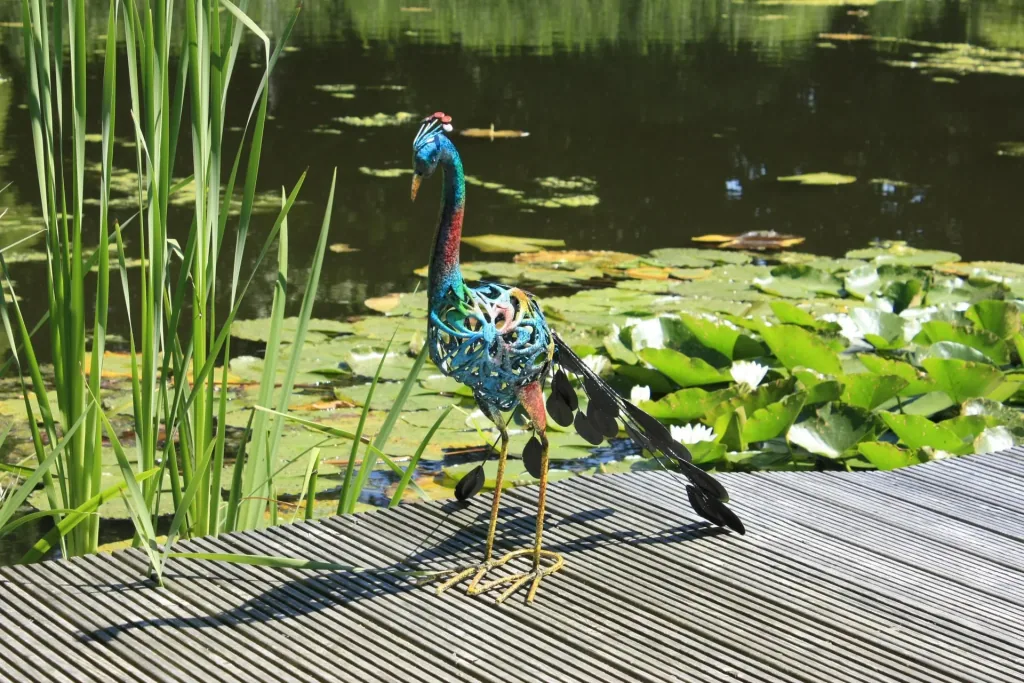 Metalldeko-Pfau Clyde mit LED - solarbetrieben