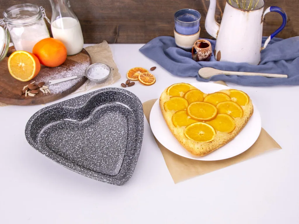 Herzbackform Granito mit Buch Blechkuchen