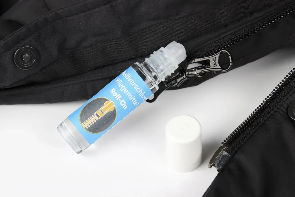 Greifhilfe für Reißverschlüsse & Reißverschluss Pflegemittel Roll-On-Set