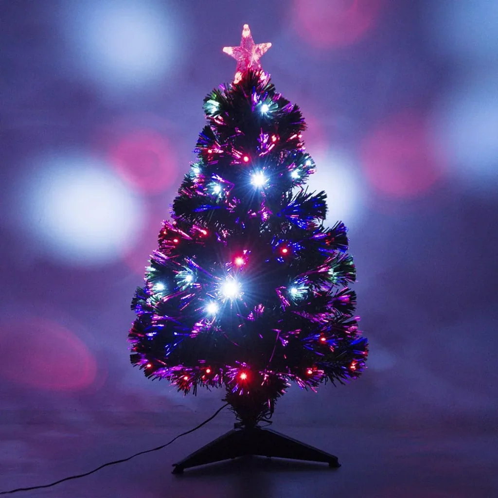 Künstlicher Tannenbaum inklusive Metallständer grün