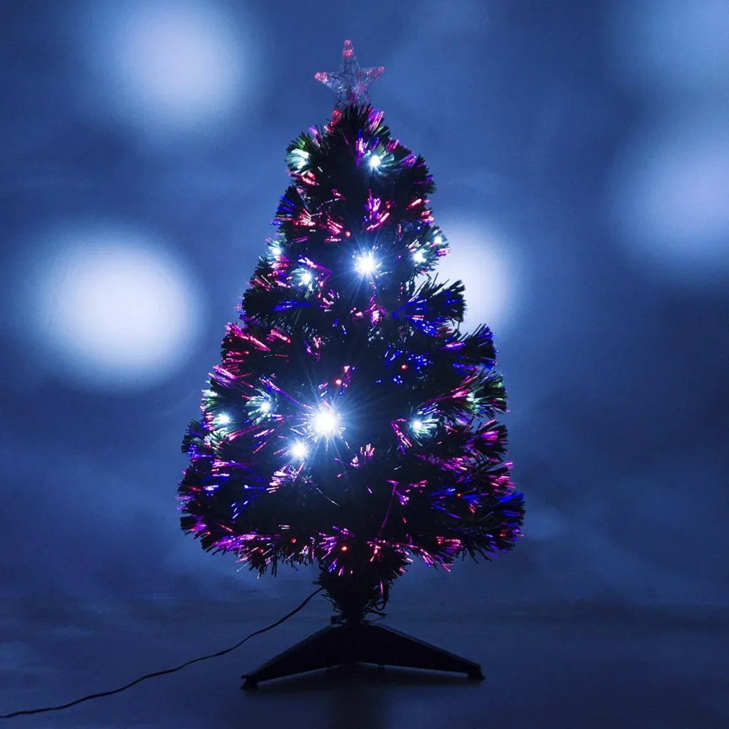 Künstlicher Tannenbaum inklusive Metallständer grün