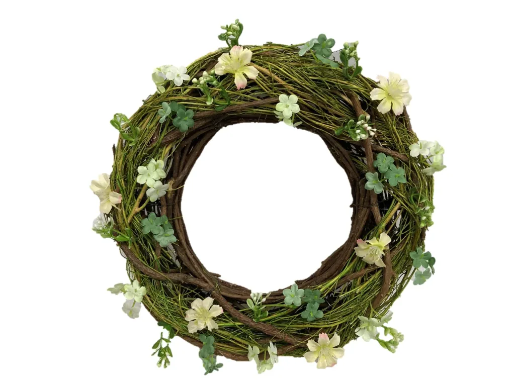 Türkranz Frühling aus Reisig verziert mit künstlichen Blumen